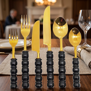Ensemble d'ustensiles de luxe dorés avec des poignées noires élégantes en forme de bulle pour des dîners raffinés et des présentations de table élégantes - Product Image 2