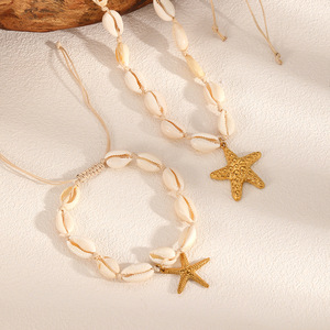 Ensemble collier et bracelet unisexe en acier inoxydable plaqué or 18 carats avec pendentif étoile de mer, style vintage pour vacances à la plage - Product Image 1