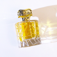 Vente en gros de flacons de parfum en verre de luxe de 100 ml, vides, réutilisables, avec bouchon à vis, forme ronde, boîte d'emballage de 50 ml pour femmes