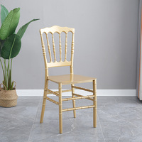 Chaise de salle à manger ergonomique empilable moderne en plastique PP léger avec finition dorée, écologique et durable pour la maison et le bureau