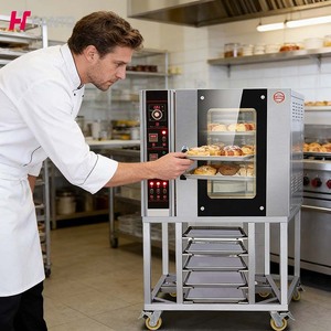 Four à convection commercial à gaz et électrique pour la cuisson de pâtisseries, pains, gâteaux, biscuits, et autres produits de boulangerie, avec 5 plateaux, idéal pour la vente en boulangerie. - Product Image 1