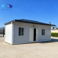 Conteneur utilitaire extérieur multifonctionnel préfabriqué blanc personnalisé avec toit ondulé et grilles de sécurité