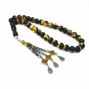 Wholesale amber honeystone Muslim prayer beads 33 10 mm Islamic worship beads for cross-border wholesale supply