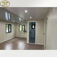 Maison de conteneur extensible pliable modulaire préfabriquée mobile de luxe de 20 pieds avec 2 chambres à coucher et une salle de bain complète