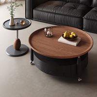 Table de cocktail ronde noire contemporaine avec roulettes pour hôtel et salon