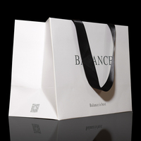Luxury Brown Paperboard Custom Printed Gold Foil Logo Durable Recyclable Gift Bag for Shoes & Clothing Exhibitions