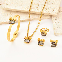 Ensemble de bijoux tendance pour femmes en acier inoxydable 316 et cristal, nœud papillon en strass, collier, bracelet, boucles d'oreilles, bague - plaqué or 18 carats