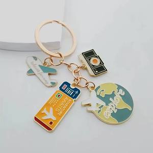 ห่วงโซ่เดินทางสำหรับนักเดินทางพวงกุญแจลูกโลก5ข้อสีเหลือง/ชมพู - Product Image 3