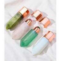 Bouteille d'huile essentielle pour massage facial par acupression, en cristal hexagonal naturel violet, rose et blanc, pour les professionnels.