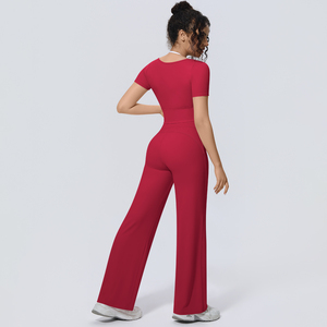 Set Yoga all'ingrosso da <span class=keywords><strong>Donna</strong></span> con <span class=keywords><strong>Top</strong></span> Sportivo a Maniche Corte Halter e Pantaloni a Gamba Larga Imbottiti Effetto Seconda Pelle - Set Fitness - Product Image 5