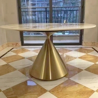 Table à manger ronde en pierre frittée avec base en acier inoxydable et plateau en marbre doré, directement de l'usine du Guangdong