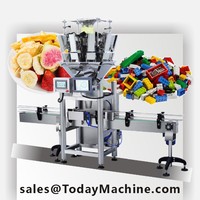 Machine de remplissage et de pesage pour pots et bouteilles de 200g de granulés de chocolat et de noix pour éclairs