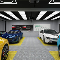 Station de lavage de voitures électrique clé en main avec marquages de sécurité et rangement organisé des outils pour des opérations efficaces