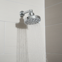 Pommeau de douche pluie rond moderne en chrome 10 cm à texture haute et trous de formes variées, installation facile pour salle de bain d'appartement