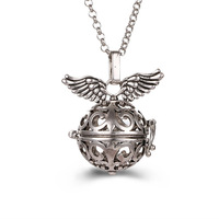 Collier porte-arôme parfumé plaqué or rétro tendance avec chaîne à maillons design creux pendentif parfum huiles essentielles unisexe