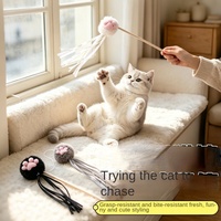 Jouet interactif pour chat en peluche avec design de patte mignon et rubans flottants