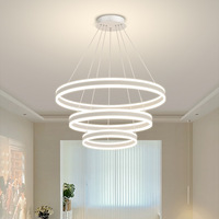 Lustre circulaire à anneaux Led moderne Lustre rond en cristal métallique Lustre à anneaux moderne simple et moderne
