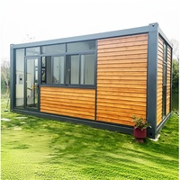 Casa Contenedor Modular Prefabricada y Desmontable con Gabinetes Personalizados en Tonos de Madera para Oficina, Sala de Estar y Taller