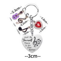 Porte-clés en acier inoxydable sur le thème de la musique - Pendentif guitare et note, anneau porte-clés avec cœur gravé
