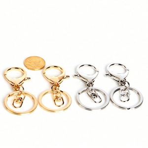 Vente en gros de crochets mousquetons en métal plaqué, fermoirs mousquetons, accessoires pour porte-clés circulaires DIY, porte-clés en métal, boucles en vrac pour la fabrication de bijoux - Product Image 4