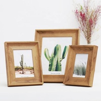 Cadre photo en bois de petite taille 5x7 avec logo personnalisé et inscription, livraison rapide depuis l'usine chinoise, pour une présentation sur table