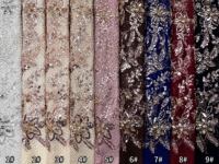 Tissu en dentelle de haute couture de luxe 2026 avec strass thermocollants et maille de cristal scintillante pour robe de soirée haute couture