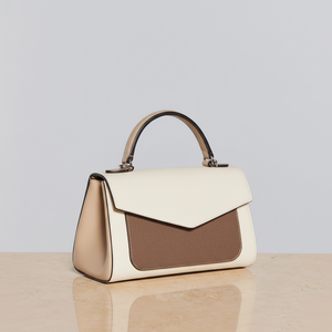 Two-Tone <b>Handbag</b>. Chic white and <b>tan</b> color block top-handle style. Available at wholesale prices - Product Image 1