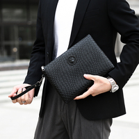 Sac à main pour homme en cuir PU de luxe, grande capacité, imperméable, avec logo, fermeture éclair, style minimaliste, vente en gros pour les professionnels de la mode