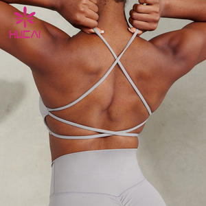 حمالة صدر رياضية نسائية جديدة من HUCAI بشعار مخصص، مثيرة ورفيعة بحمالات رفيعة وظهر مفتوح متقاطع للتمارين الرياضية واليوغا - Product Image 1