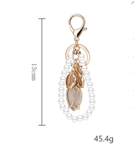 Portachiavi con ciondolo a forma di tulipano in cristallo e perle, design alla moda, per auto - Product Image 4