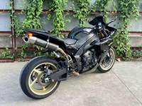 Moto sportive Yamaha R1 600-1000CC 4 cylindres, Japon, vitesse maximale >80 km/h, ultra-rapide et puissante, pour la conduite sportive et les loisirs.