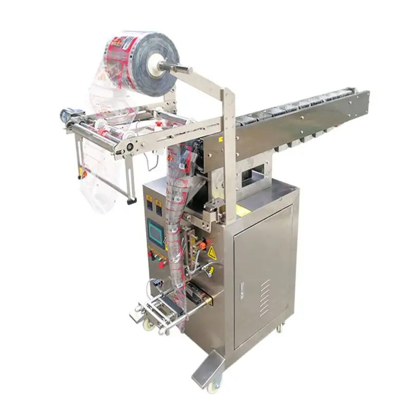 Machine d'emballage de remplissage verticale automatique pour granules, fruits secs, chaîne, particules d'aliments gonflées, seau à basculement