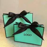 Sacs en papier cadeau de luxe blancs personnalisés avec logo privé imprimé, avec nœud en ruban pour chaussures