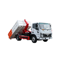 Camion benne hydraulique à bras articulé : Opération multi-conteneurs pour un transfert de déchets efficace et une logistique économique