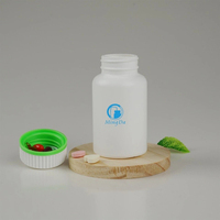 Bouteille ronde en PEHD avec bouchon texturé à double couche pour produits pharmaceutiques, compléments alimentaires, emballage alimentaire, conteneur en plastique blanc de 150 ml
