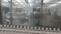 Ligne de production de remplissage de solution saline de glucose 100ml/500ml, usine complète de la conception à la mise en bouteille et à l'emballage