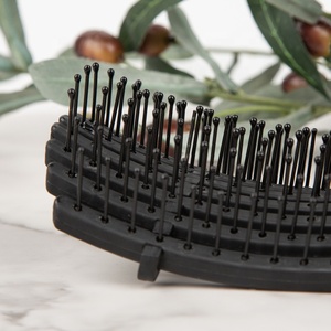 Gloway fabricant Oem noir séchage rapide par soufflage plastique 9 rangées pagaie humide ventilé <span class=keywords><strong>brosse</strong></span> à <span class=keywords><strong>cheveux</strong></span> bouclée démêlante <span class=keywords><strong>brosse</strong></span> pour vagues - Product Image 4