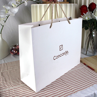 Luxury Recyclable Craft Paperboard Shopping Bags Custom Logo Offset Printing Hand Length Handle for Clothing Small Businesses