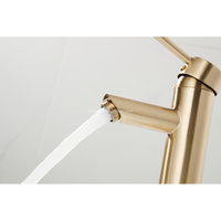 Robinet de lavabo moderne simple en cuivre à installation monotrou, finition or zirconium, à bec droit
