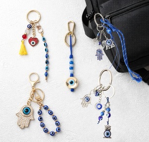 พวงกุญแจตาปีศาจสีน้ำเงินแบบกำหนดเอง พร้อมลูกปัดนาซาร์ รูปมือฮัมซา นกฮูก ช้าง ดีไซน์เชือกถัก  จี้ห้อยกระเป๋า  รับผลิตแบบ OEM ODM - Product Image 1