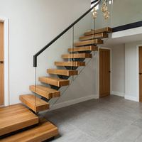 Escaliers flottants intérieurs invisibles avec bande de roulement en bois de chêne blanc de 40mm