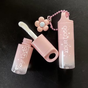 Tubo colgante <span class=keywords><strong>de</strong></span> flores con brillo <span class=keywords><strong>de</strong></span> labios Etiqueta privada Vegan Logotipo personalizado Lip Plumper Oil Hidratante Hydra Lip Gloss - Product Image 1