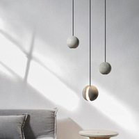 Suspension LED sphérique en béton style Wabi Sabi industriel moderne pour comptoir de restaurant