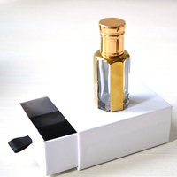 Parfum Attar Oud Arabe en mini-bouteilles avec emballage en boîte blanche/noire