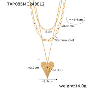 Collar con Colgante de Corazón Texturizado con Ojo Turco, Chapado en Oro de 18K |   Cadena de Acero Inoxidable en Capas con Símbolo Protector - Product Image 3