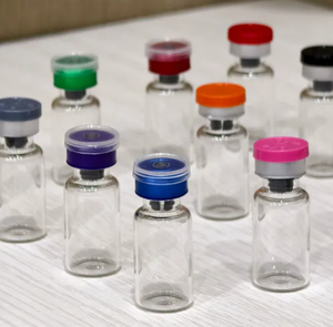 Bouteilles cylindriques en verre miniatures de Zhejiang à usage industriel, avec surface imprimée par transfert thermique et sécurité enfant. - Product Image 6