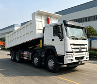 Truk Dump HOWO 8X4 12 Ban yang Tahan Lama dengan Sistem Pengangkatan Hidrolik Penuh untuk Pengangkutan Sampah Konstruksi dan Bijih