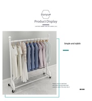 Porte-vêtements sur roulettes de style minimaliste nordique, support de rangement pour vêtements sur pied, adapté aux chambres à coucher