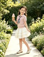Ensemble d'été 2 pièces pour enfant : Polo en polyester à manches courtes avec jupe à volants superposés en coton et cravate imprimée, idéal pour le jardin et la mer
