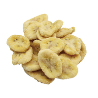 Gezonde zoete knapperige vacuüm gefrituurde bananen snacks in doosverpakking met harde textuur